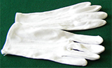 This is a picture of a pair of white Gloves